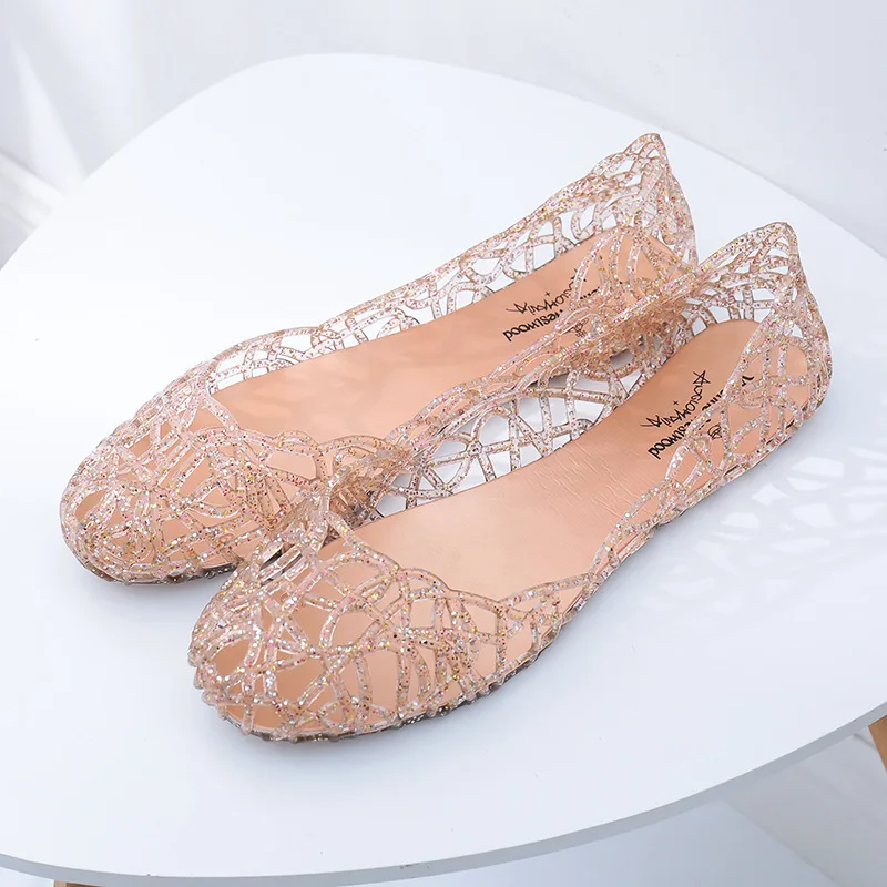 Sandalias de verano para mujer, zuecos de cristal de suela plana hueca, antideslizantes, boca baja, zapatos romanos de gelatina, sandalias de playa