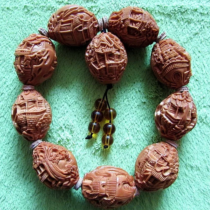 

Оливковый браслет, большой кусок семян, старый каменный пейзажный сад