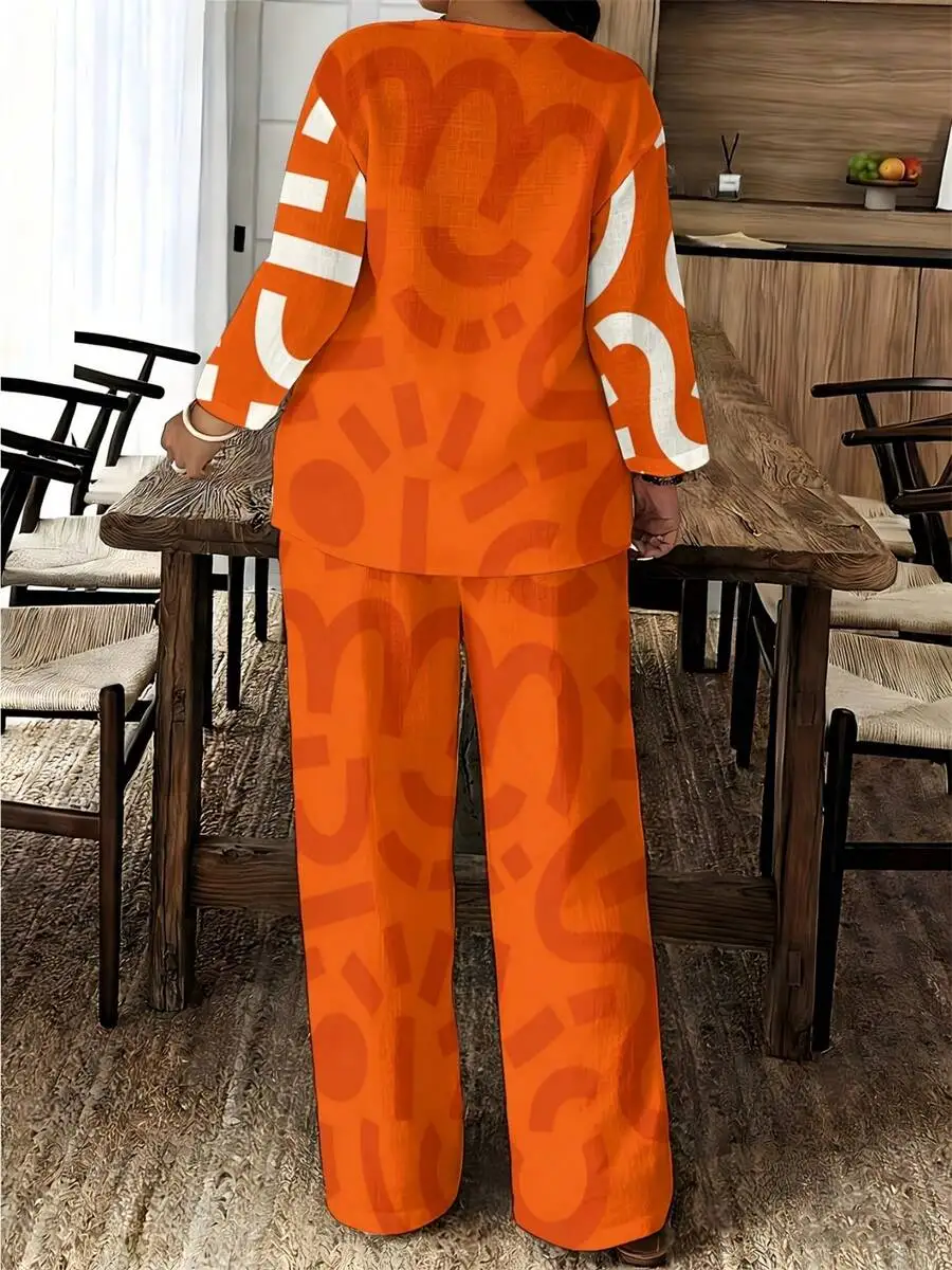 

Orange Abstract Geometric Print Plus Size Two Piece Set: Notched Neck 3/4 Sleeve Top + Wide Leg Pants, Loose Breathable For