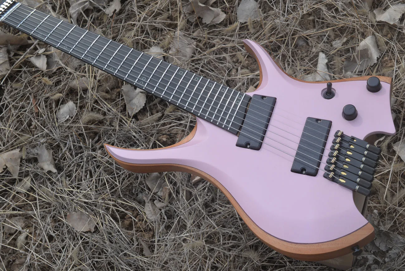 2024 Fanned frets 7 Strings Headless Electric Guitar Pink color 5-ply Roasted Maple Neck Ergonomic Ebony MAHOGANY