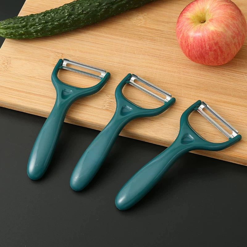 Vegetable and fruit peeler with PP handle. Multi-functional potato and apple peeler. Kitchen accessory.