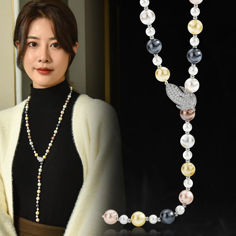 

The long pearl necklace for women exudes a high-end charm. The tree leaf pearl sweater chain is elegant and versatile