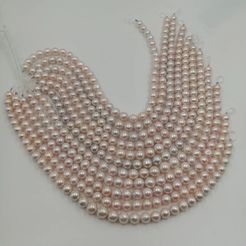 11-12 mm white round loose wholesale freshwater pearl in strand