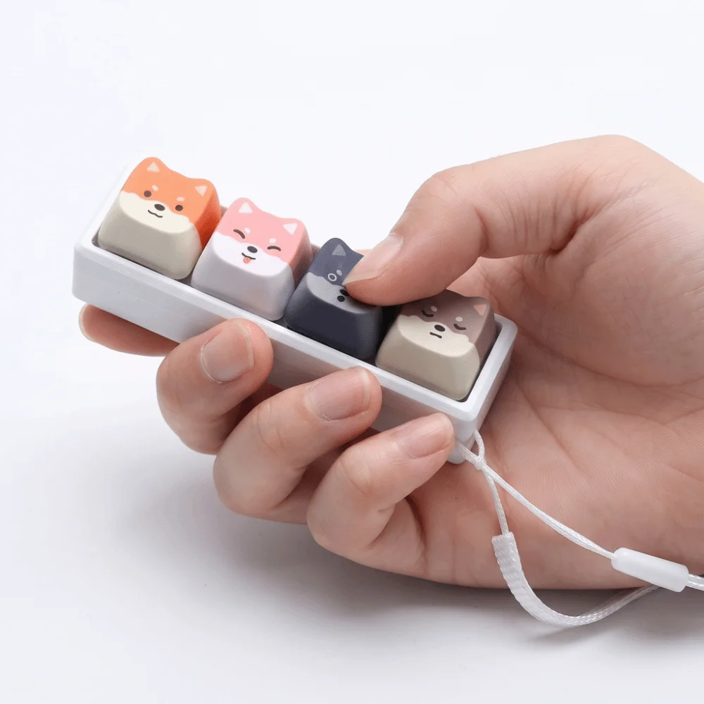 4 Keys Mechanical Keycap Keychain Lightweight Portable Finger Press Keyring Pinch Design Cat Shape Finger Press Keycap Keychain view 3