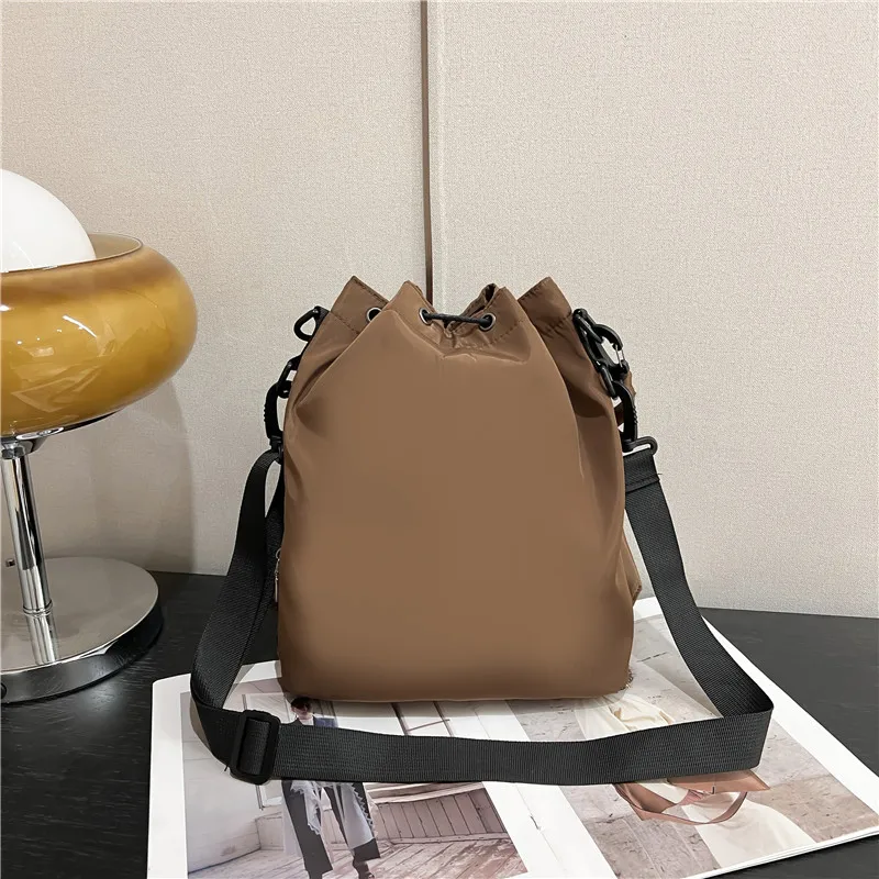 Korean Fashion Nylon Fabric Drawstring Bucket Bag Personalized Versatile Handheld One Shoulder Crossbody Bag for Daily Leisure