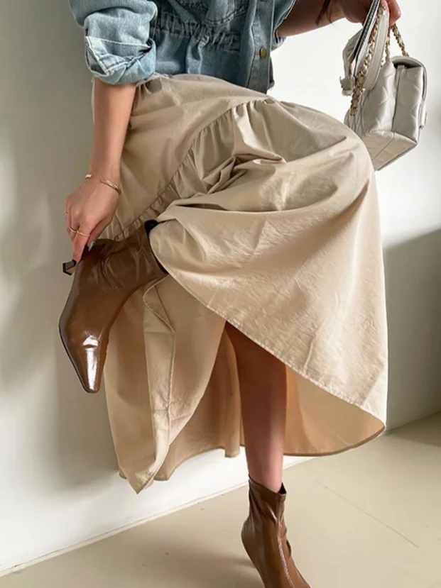 Saia midi psada fena com mangas sino, cintura elástica, modelagem alta, longa, de aodão, cor sólida, estilo casual p...