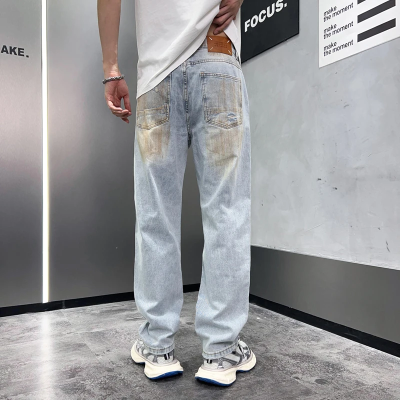 Amerikaanse Bedrukte Distressed Loszittende Trendy Jeans Met Rechte Pijpen