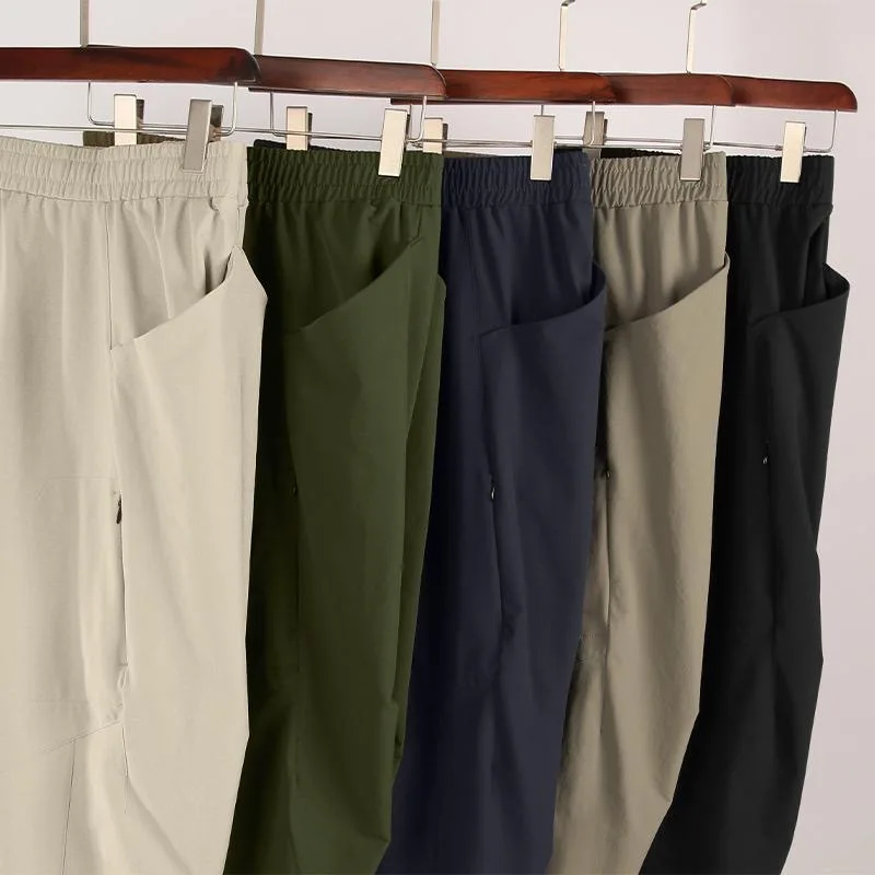 بنطال رياضي رجالي سريع الجفاف كاجوال مستقيم مناسب مع جيب بسحاب رفيع للاستخدام الخارجي، تصميم بخصر مطاطي لراحة ركوب الدراجات
