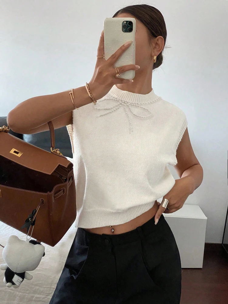 

Осень/зима, новые поступления, дизайнерский вязаный жилет с бантом и бусинами, пуловер, элегантный и универсальный шерстяной вязаный женский топ