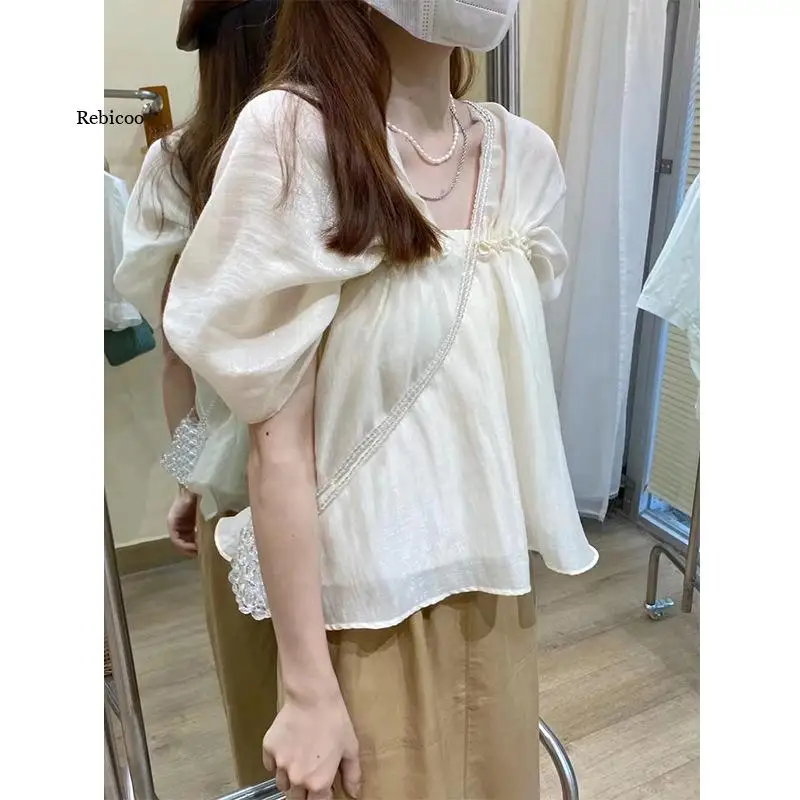 

2022 Summer Top Temperament Loose Fashion Solid Pleated Short Sleeve Shirt Women Casual Blouse Korean