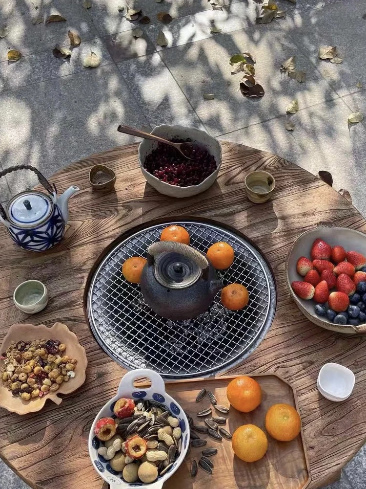 

Old elm stove tea table log small round table household charcoal fire stove tea table indoor new Chinese fire