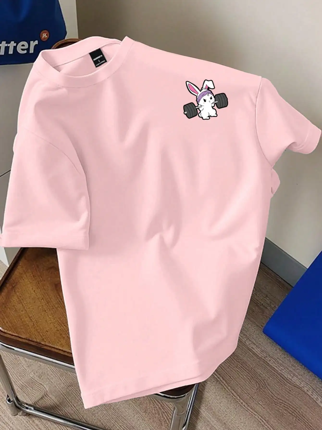 

Pink Casual Short Sleeve T-Shirt with Cartoon Bunny Lifting Weights Graphic