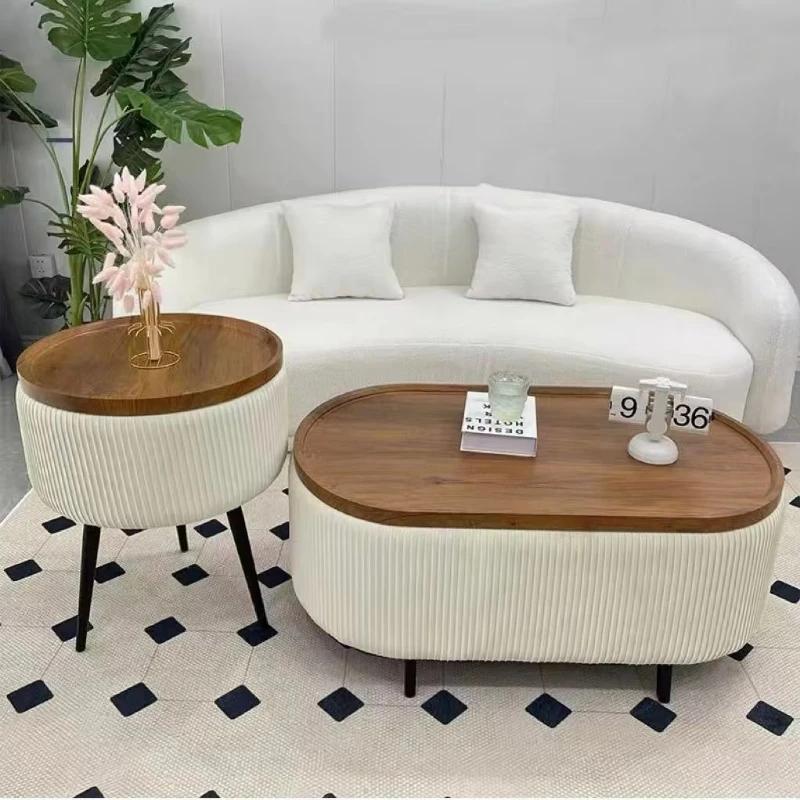 Modern style oval coffee table with upholstered cushions and concealed storage