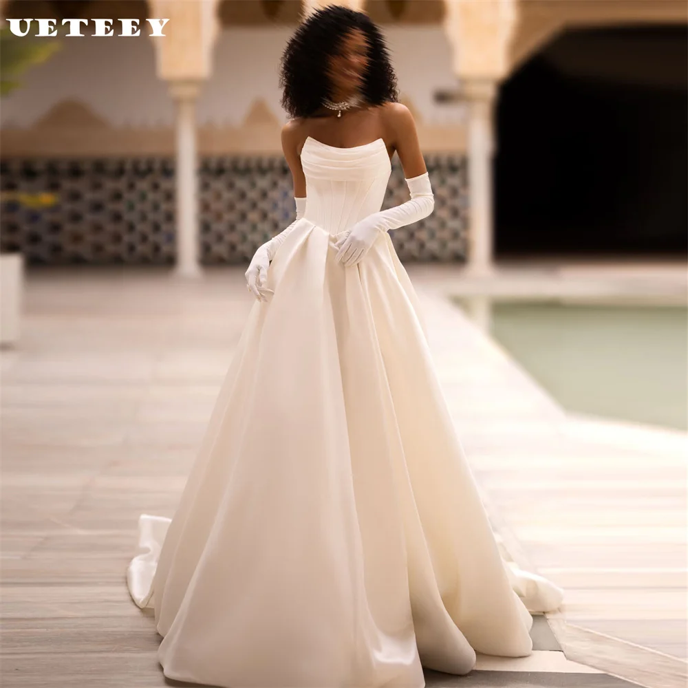 

UETEEY Customized Strapless Sleeveless Crepe Pleats Wedding Dress Elegant A Line Zipper Back Floor Court Train Bridal Gown