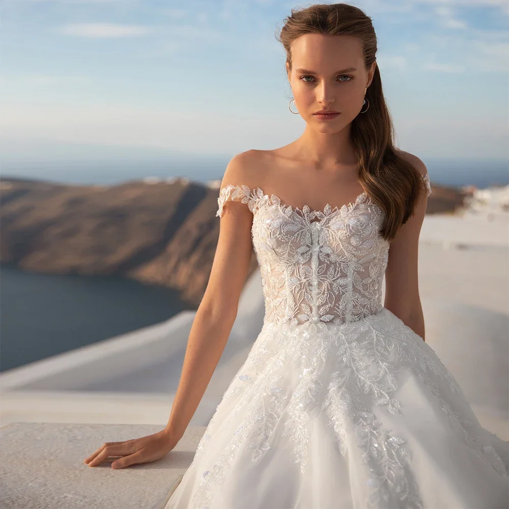 فساتين زفاف مثيرة بدون حمالات على شكل حرف a منخفضة على شكل حرف V من الخلف الوهم فساتين زفاف مزينة بالزهور مطرزة حسب الطلب فيستدوس دي نوفيا