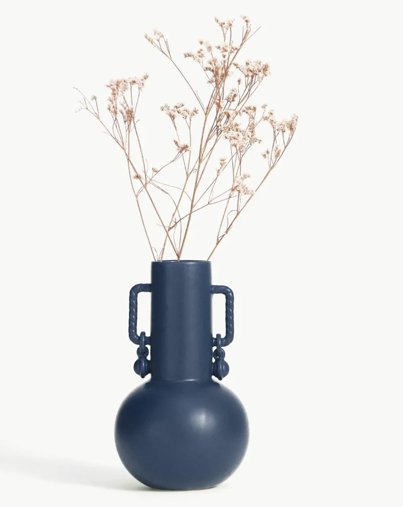 Handmade smooth dark blue twisted rope handle with spherical pendant vase