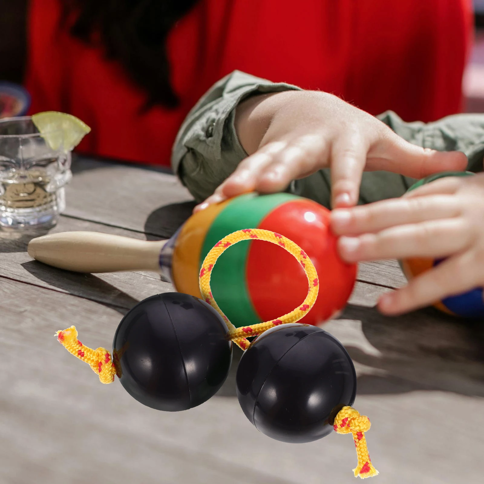 

2Pairs Rhythm Sand Balls Musical Shaking Ball Instrument Portable African Percussion Finger Shakers Music Ball Shaker Instrument