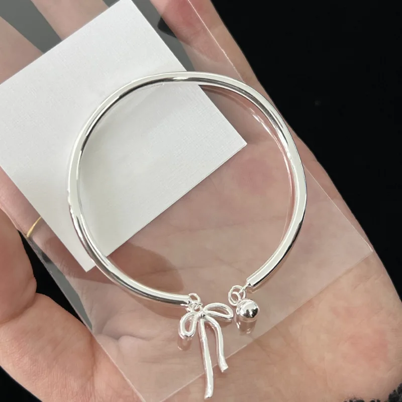 PANJBJ 925 Sterling Silver Bowknot Irregular Bracelet For Women Girl Asymmetry Open Bell Simplicity Jewelry Gift Dropshipping