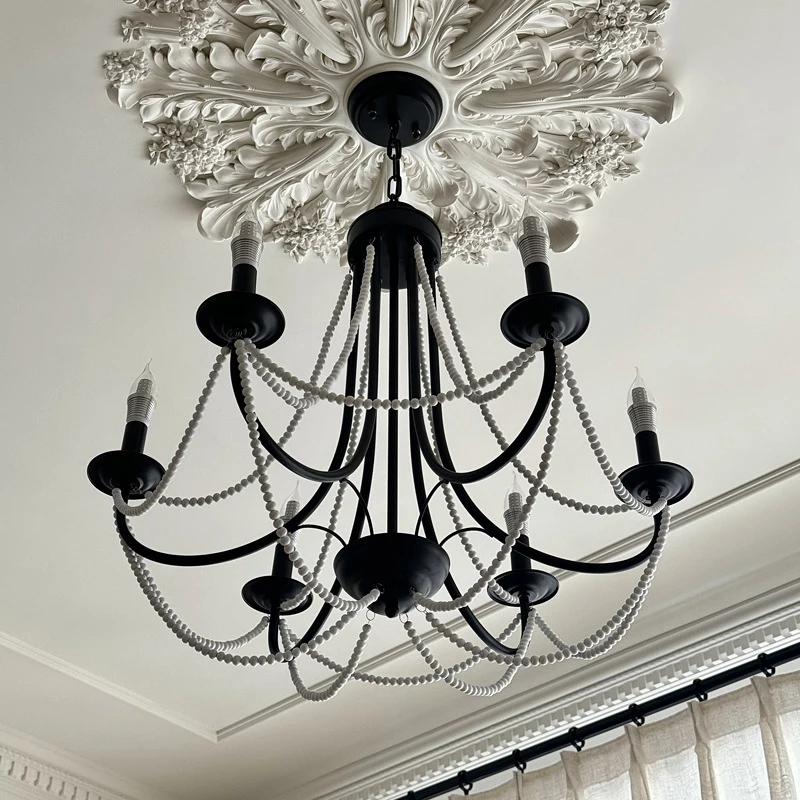 The rustic minimalist creative wrought iron wooden bead chandelier in the restaurant,the personalized lamps in the shopping mall