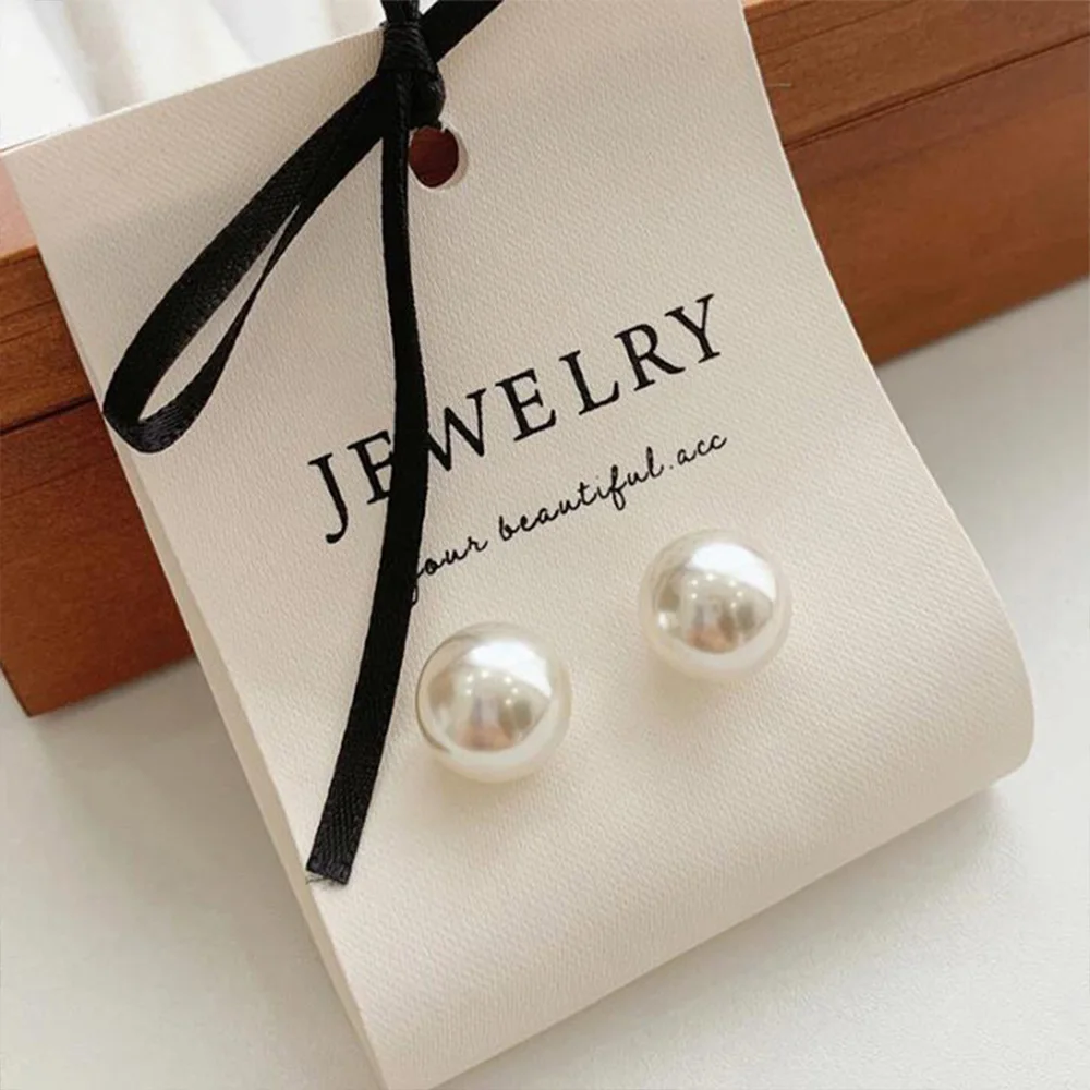 

Изготовленная на заказ белая тканевая карточка для демонстрации ювелирных изделий с черной лентой и бантом для серег, ожерелья, модная упаковка, держатель, картонный подарочный логотип