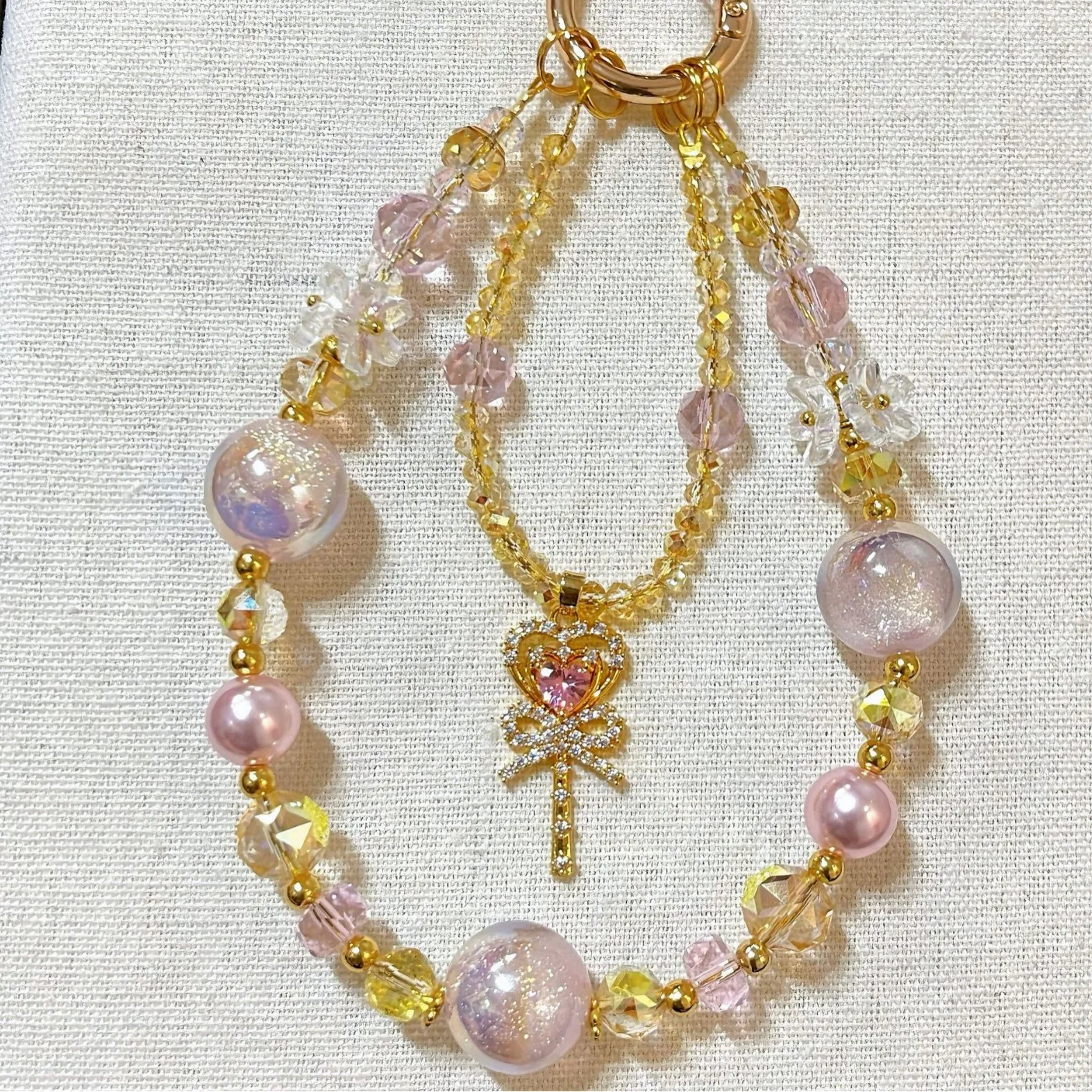 

Luxury Pink Magic Wand Pendant Phone Lanyard Crystal Pearl Beaded Wrist Strap Dreamy Fairy Style Phone Charm for Women Girl Gift