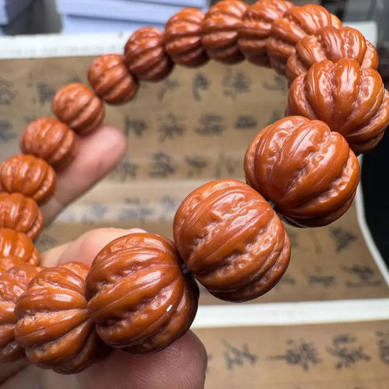 Hand-carved , large Beijing-style octagonal monkey head walnuts, single-strand bracelet 14 beads