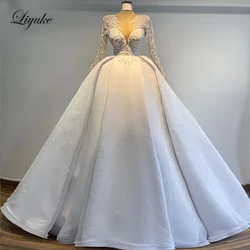 Liyuke Illusion V-Neck A-Line Wedding Dress Shiny Beading Pearl Lace Full Sleeves Elegant Bride Gowns