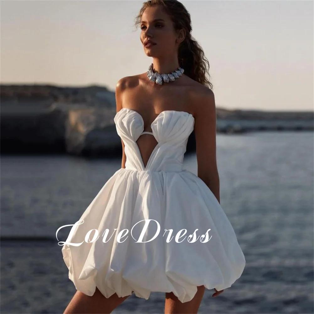 Love Beach Sexy Sweetheart Short a-line Flower Bud abito da sposa senza maniche Backless Lace Up sopra il ginocchio Mini abito da sposa pieghettato