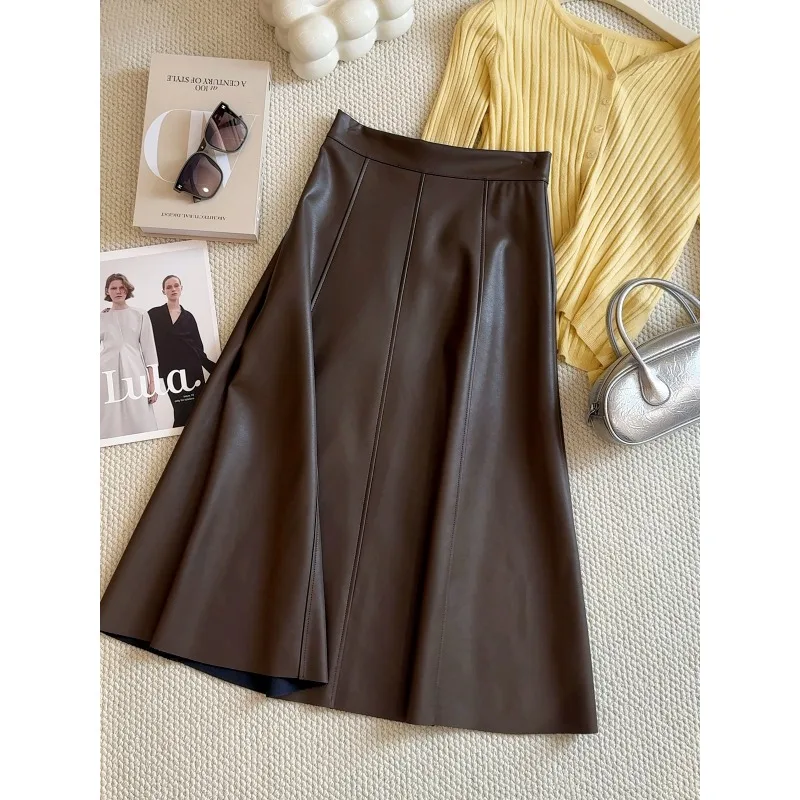 2025 Autunno Inverno Donna Elegante PU Pelle Gonna nera Pianura Ufficio Donna Slim Gonne a vita alta Temperamento Gonna di media lunghezza