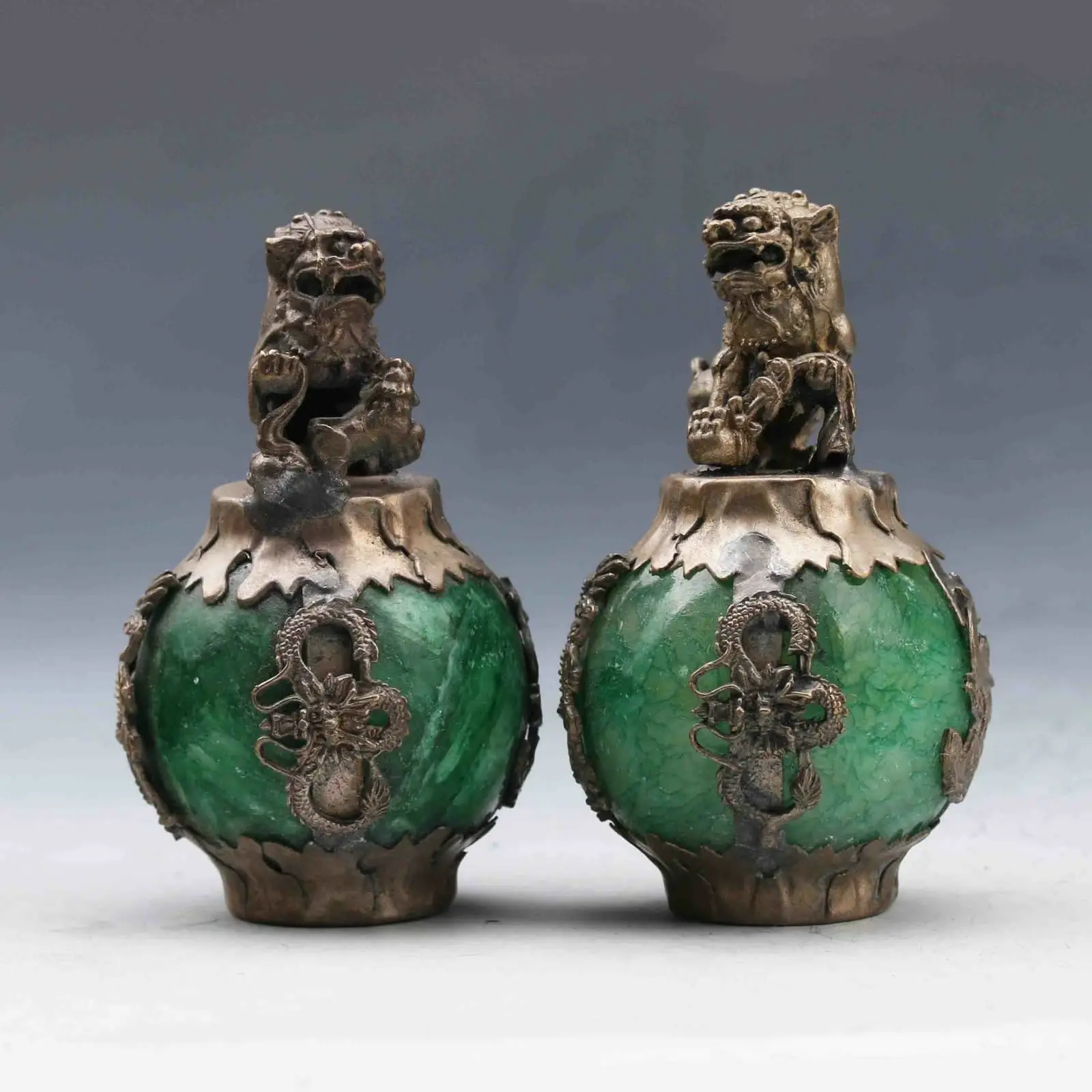 

EXQUISITE CHINESE SILVER DRAGON INLAID GREEN JADE HAND CARVED PAIR LION STATUE