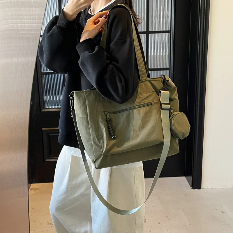 

Вместительная повседневная простая портативная тканевая сумка, новая сумка-тоут Joker, легкая сумка через плечо для поездок на работу.