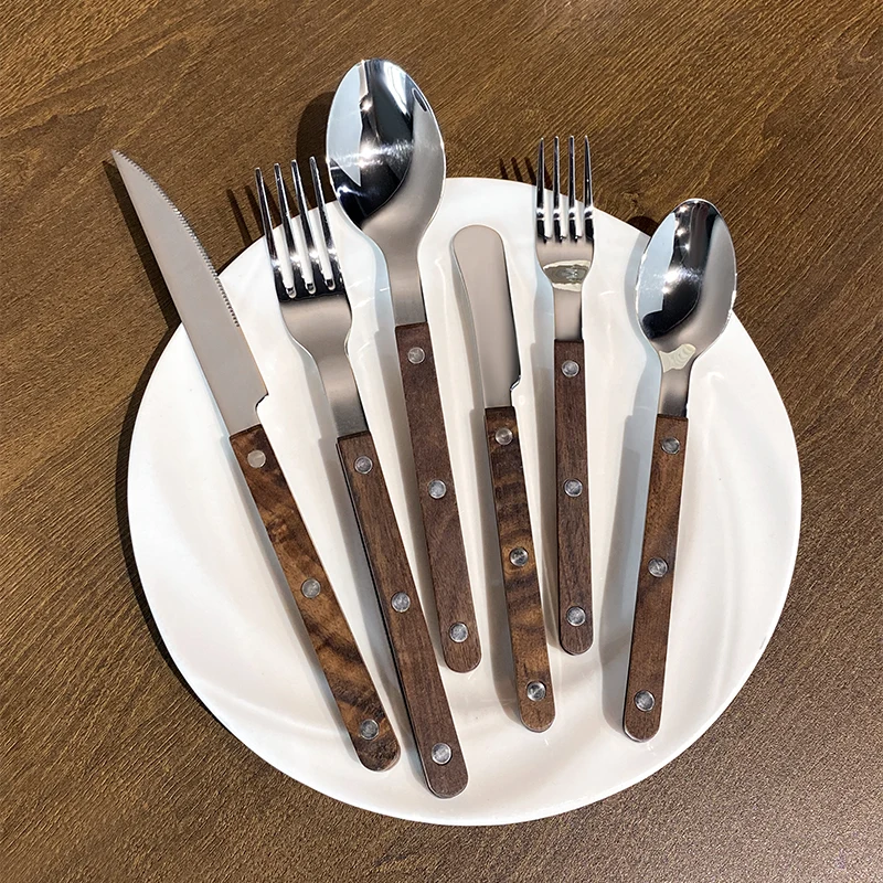 

Japanese Sle 304 Stainl Steel Western Cutlery Set with Bla Walnut Handle for Home Use Luxury Steak Knife Fork Spoon