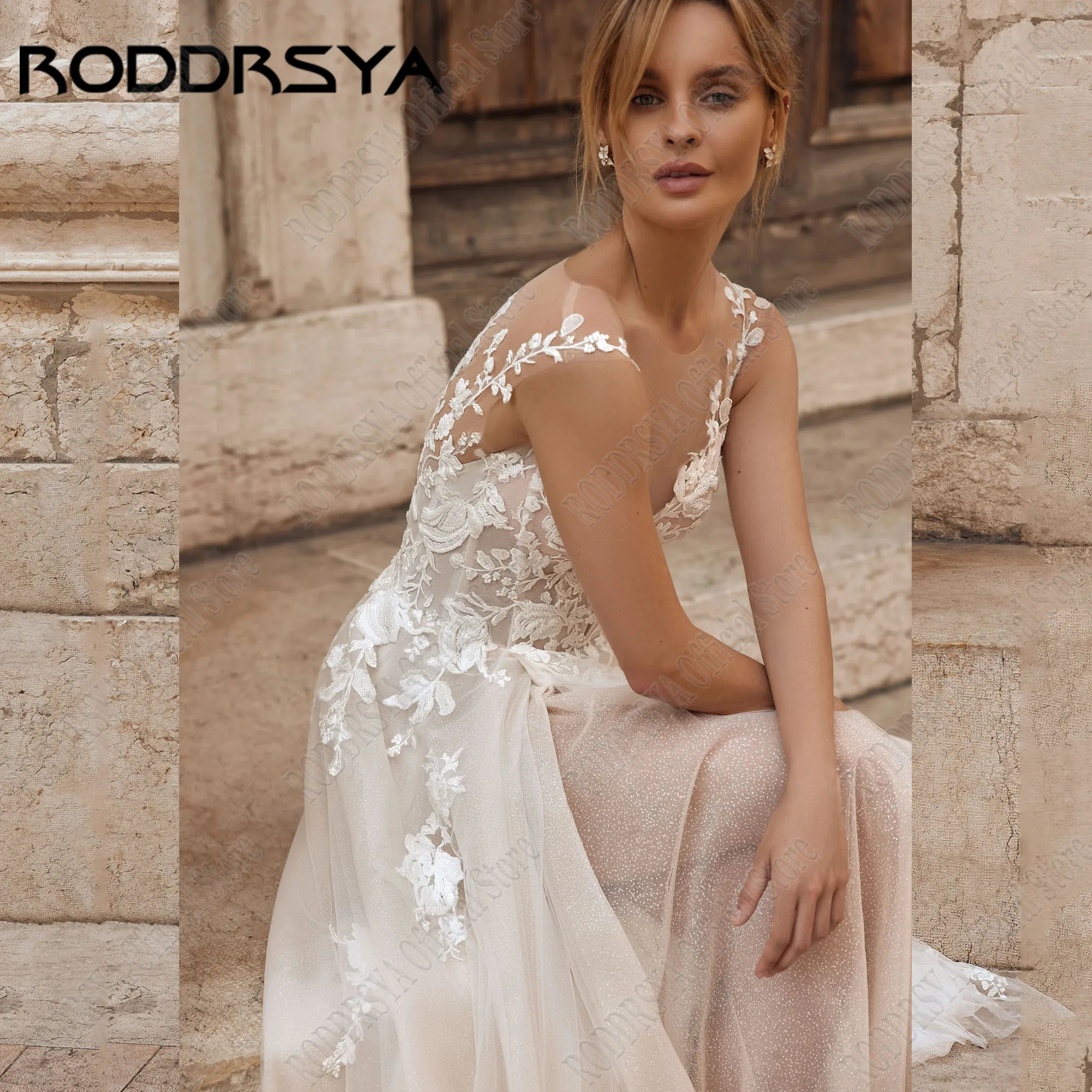 RODDRSYA فساتين زفاف متلألئة مخصصة قبعة فاخرة كم مجرد وهم الظهر Vestidos De Novia فستان العروس قطار الاجتياحRoddrsya لامعة الزفاف العرف الفاخرة قبعة الأكمام جيب كبير فانتوم صدرية دي نوفيا فستان الزفاف اكتساح ساحة القطا