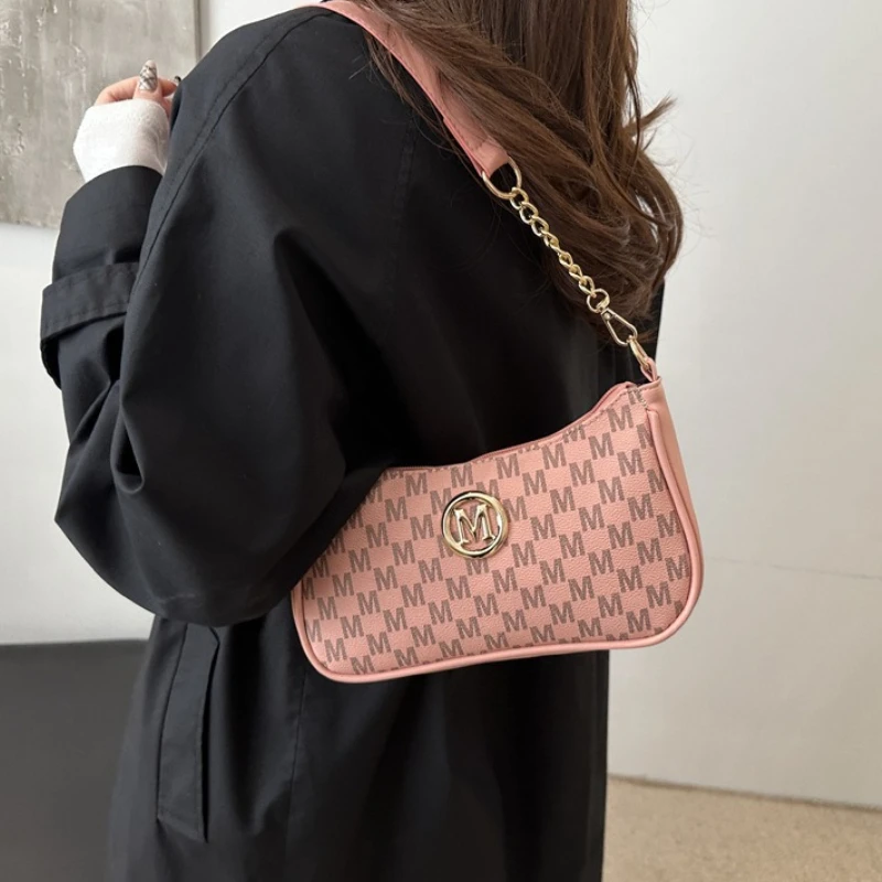 Classic Pattern Shoulder Bags Round Gold Emblem Adjustable Strap Elegant Design for Daily Commutes Dating Casual Underarm Bag