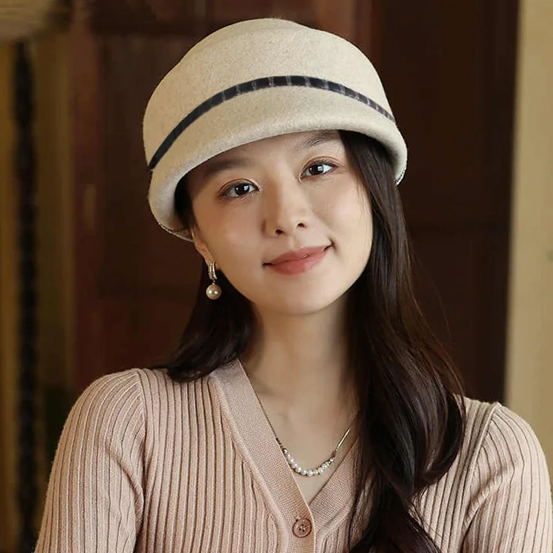 New autumn and winter hat designs for women, featuring stylish and versatile wool baseball caps in solid colors