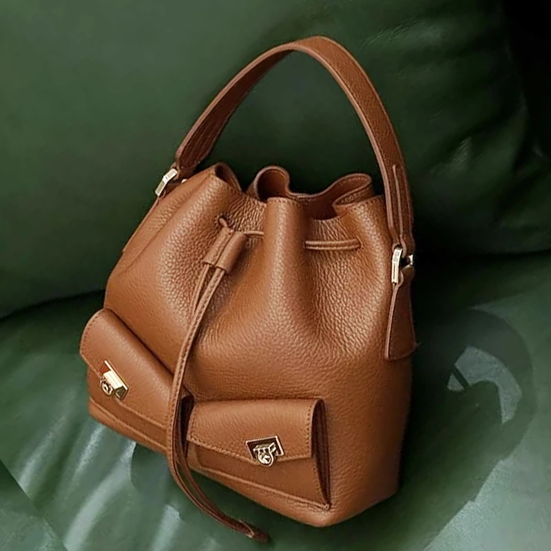 

Classic Small Bucket Bags For Women Luxury Designer Handbags Purses 2026 New In PU Metal Sheet Lock Decoration Underarm Shoulder