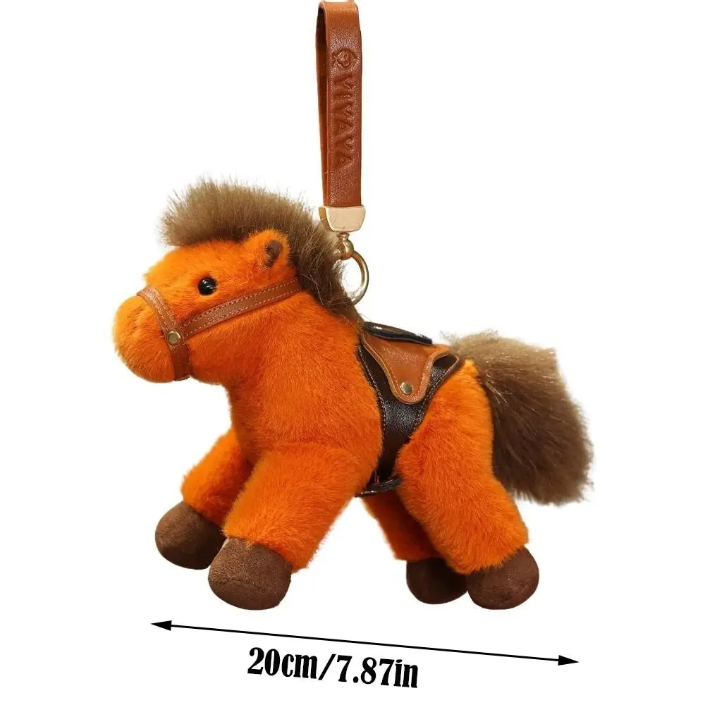 Portachiavi con ciondolo pony animale di peluche Anno del cavallo mascotte 20 cm Portachiavi pony in peluche con sella Borsa morbida Ciondolo Regalo per bambini