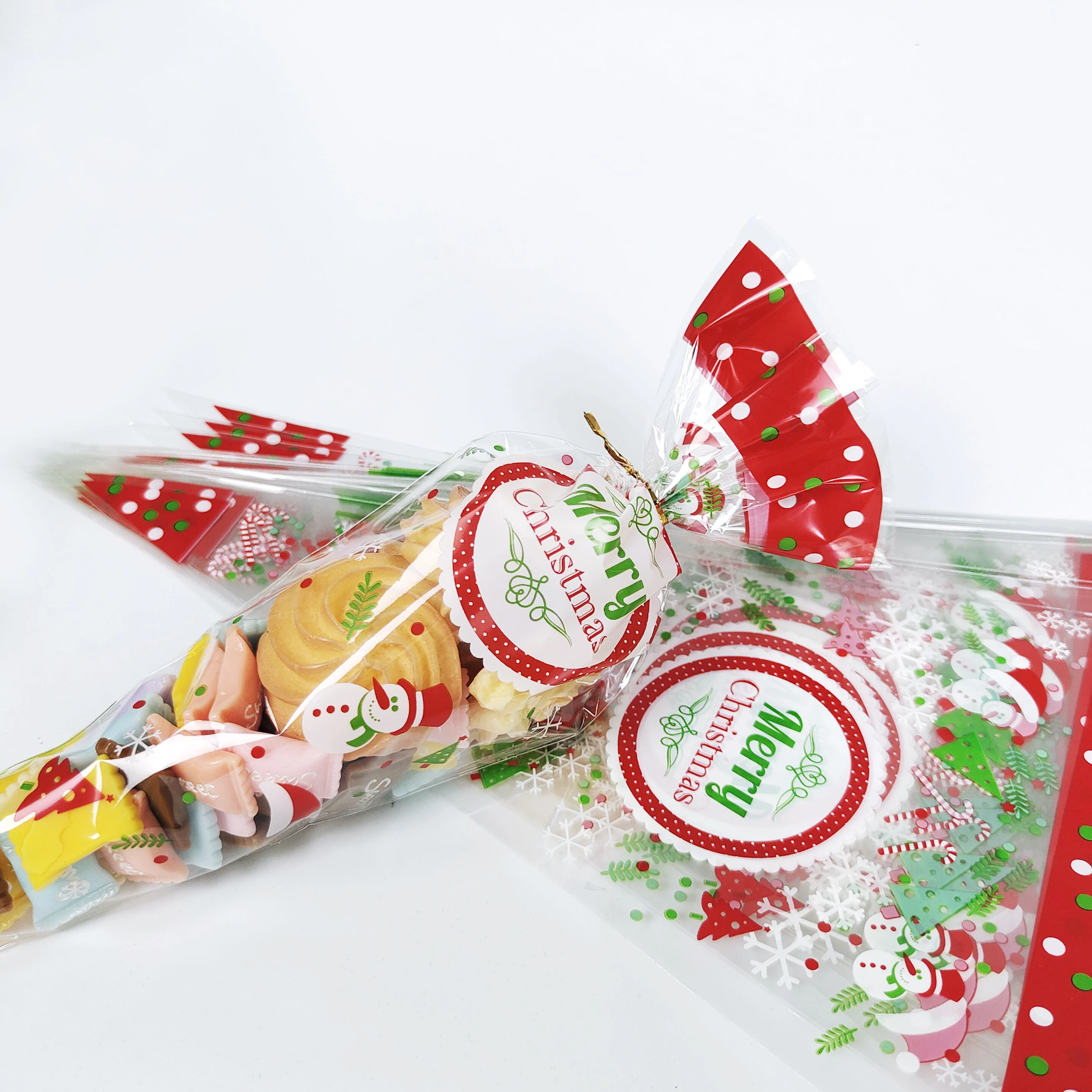 100 Stück Weihnachtsgeschenktüten Weihnachtsmann Schneeflocke Süßigkeiten Keks Kegel Tasche Kunststoff Xmax Verpackung Lieferungen Weihnachtsdekoration 2024 – Detail 9