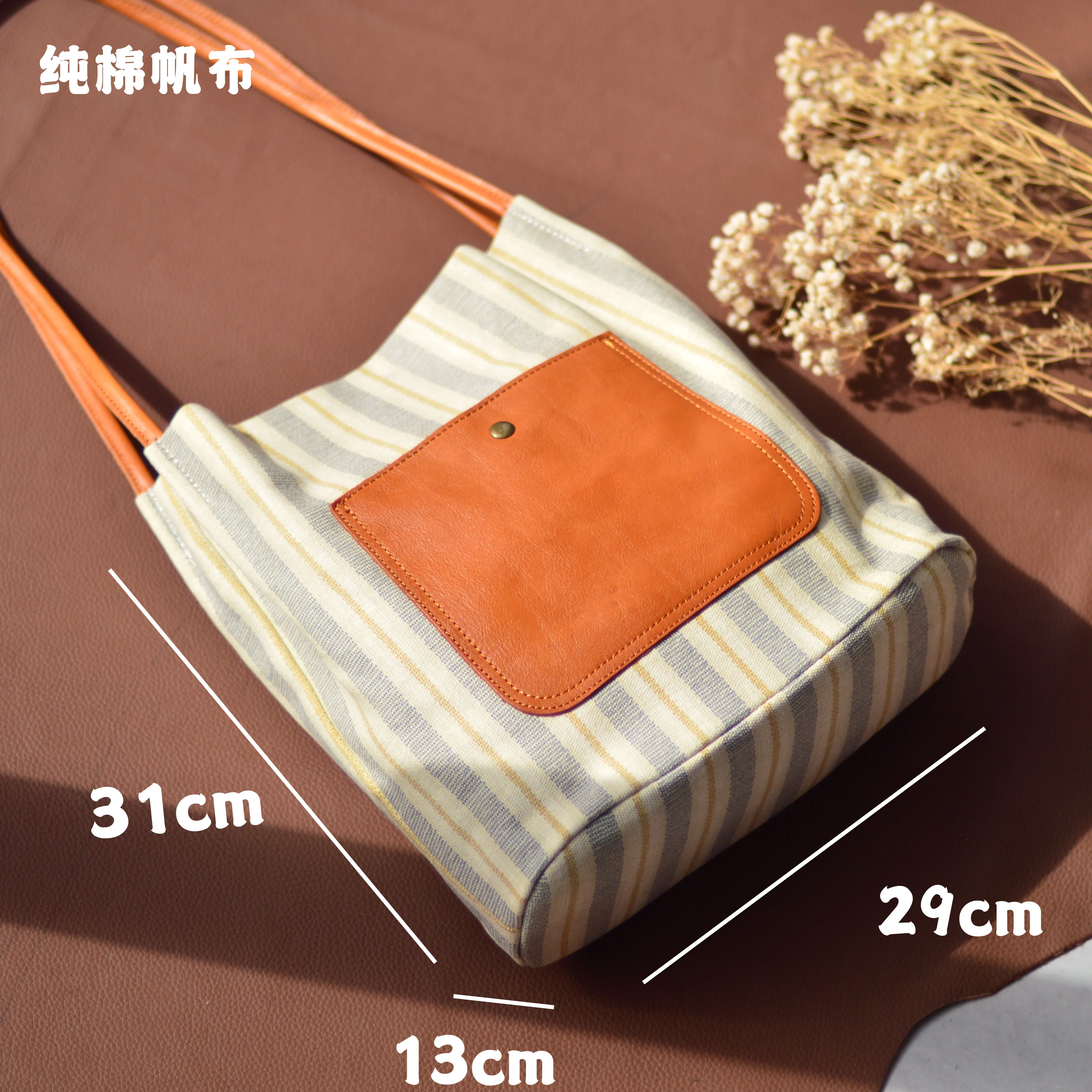 AETOO Nova bolsa de ombro único de couro da moda, sacola de ombro único versátil listrada da moda, masculina de couro simples e w