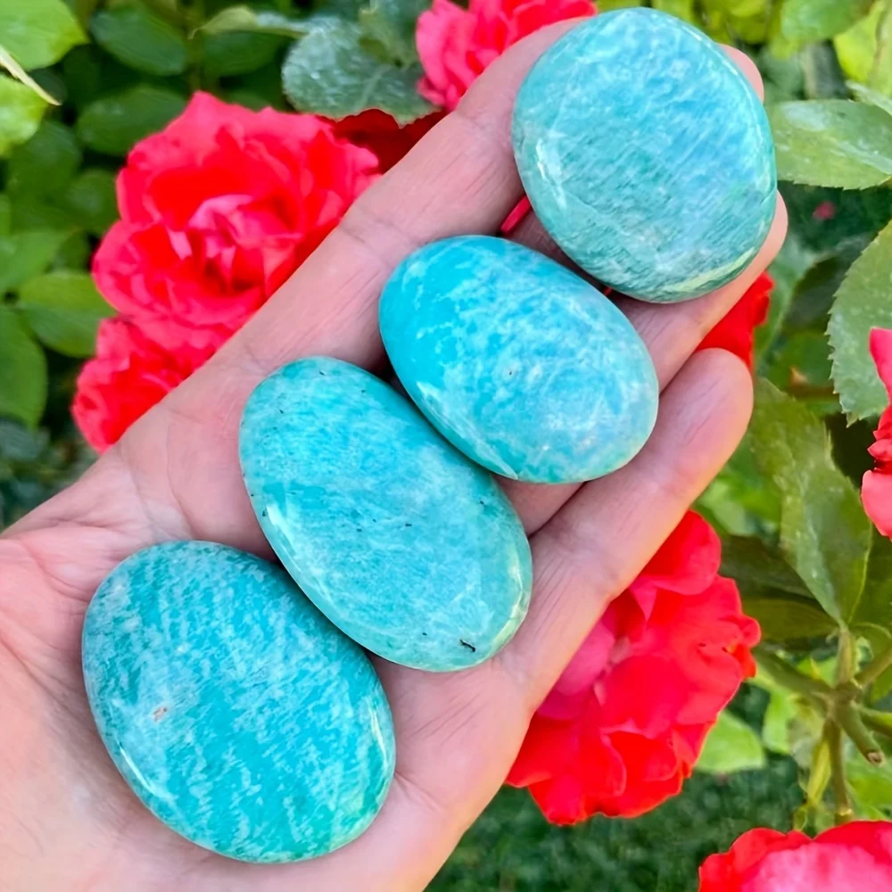 A beautiful natural amazonite – a bluish-green stone with veins, smooth spherical beads