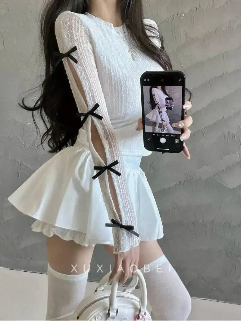 

Белая дизайнерская футболка с бантом и внутренней нижней частью, высокий кружевной топ, женская футболка, модные женские футболки, новинка 2025 года, милая модная женская футболка UU2I