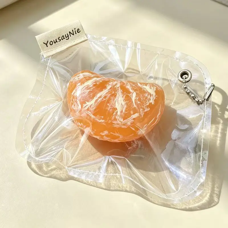Handmade realistic tangerine segment squeeze toy—convenient to carry around for stress relief.