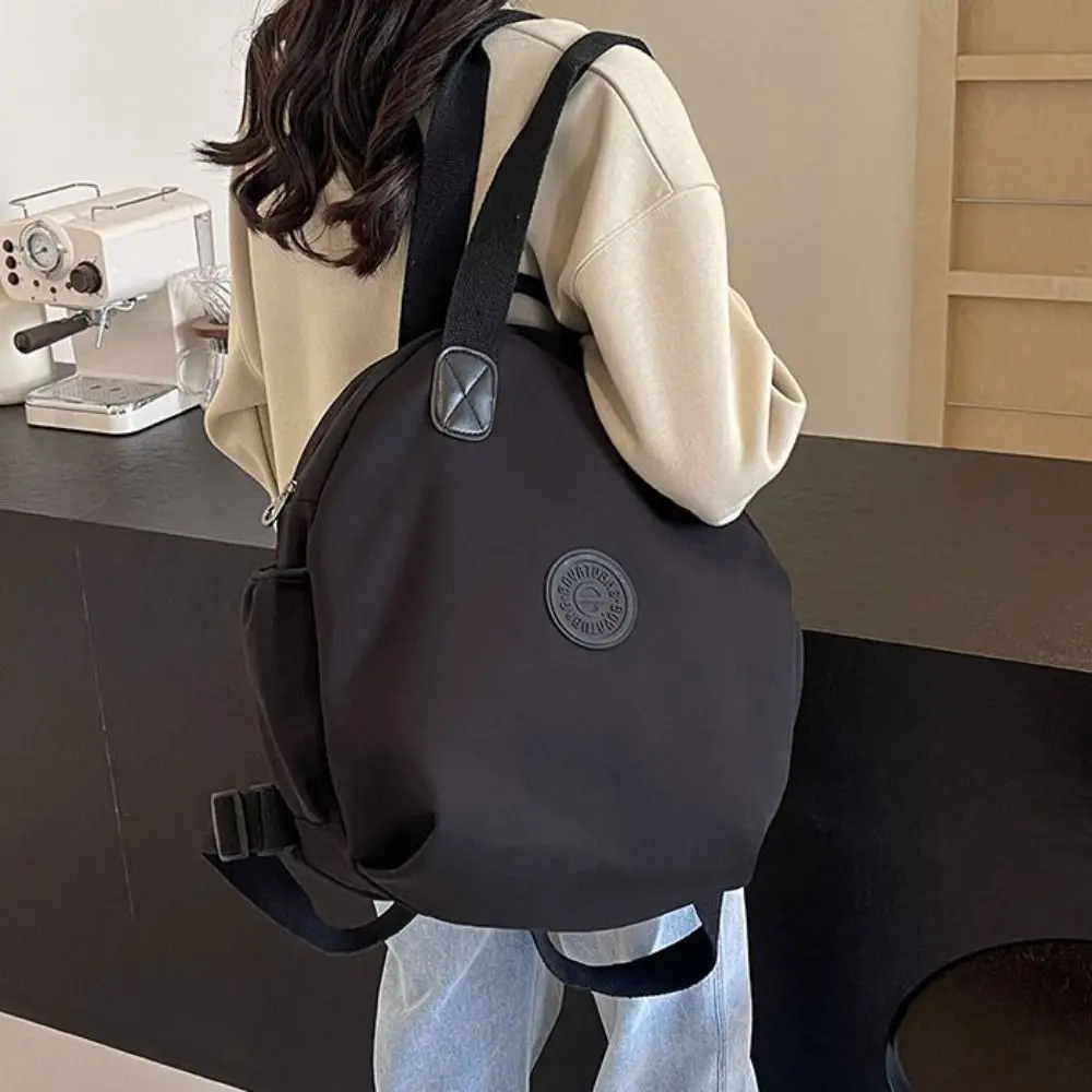 Modieuze Koreaanse stijl sport nylon rugzak effen kleur nylon reisschoudertas nicheontwerp draagtas fitnesstas computer