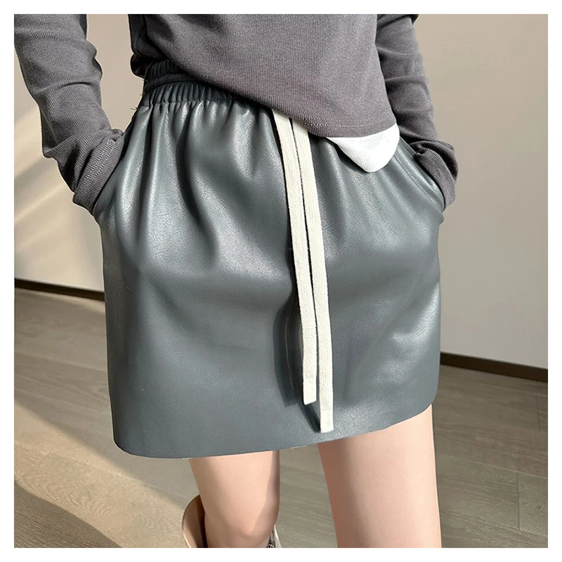 

High waisted leather autumn winter 2024. New elastic waist, hip hugging short casual half length skirt, trendy goth skirt