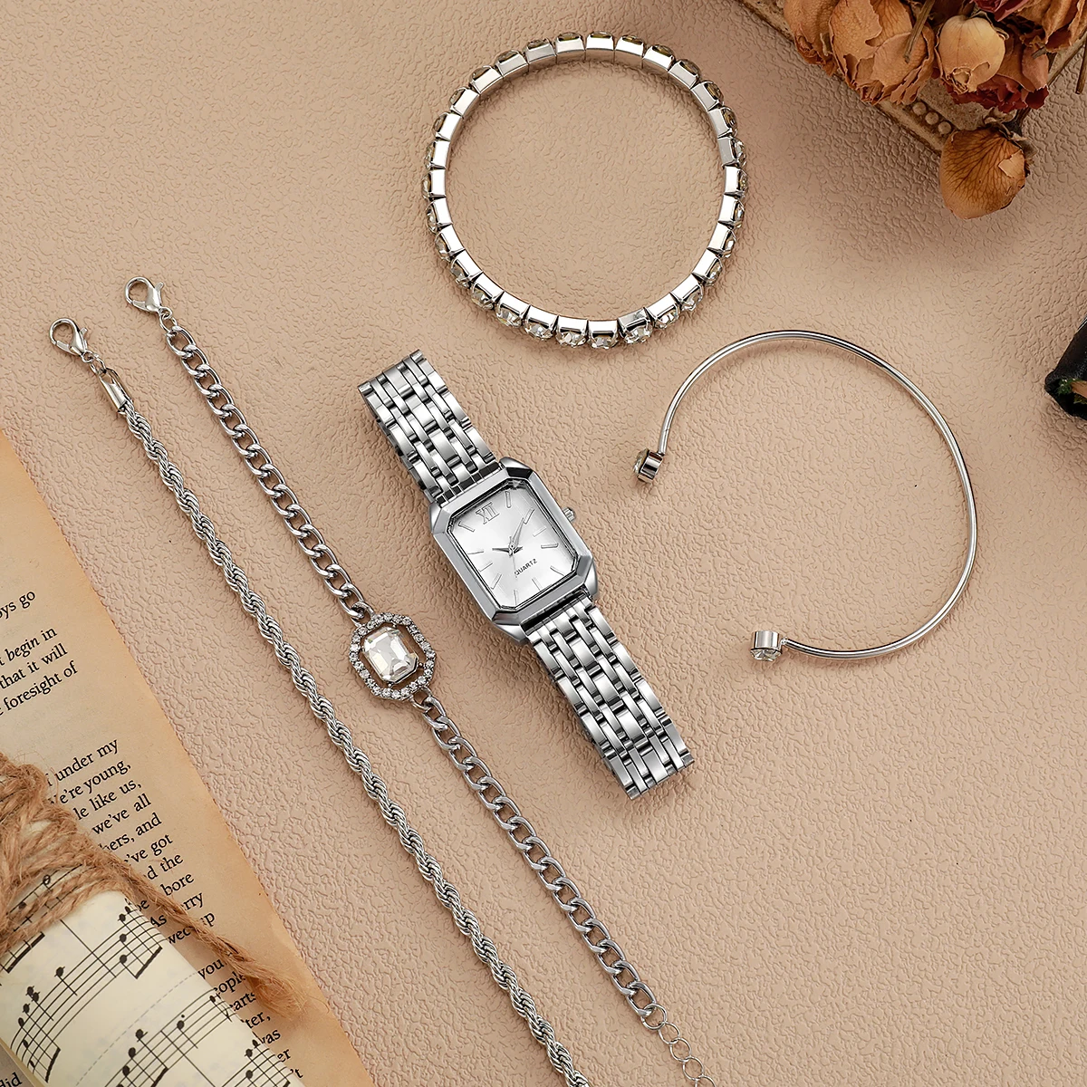 ساعة كوارتز كلاسيكية جديدة بحزام فولاذي بحزام فولاذي كلاسيكي بسيط فاخر مع سوار ماسي مائي