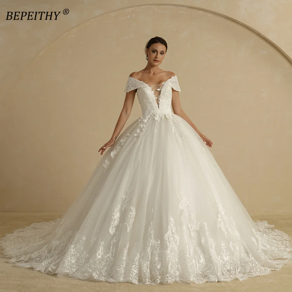 BEPEITHY Customized Sexy Deep V Neck Ball Wedding Dresses 2025 Bride Sleeveless Court Train Glitter Ivory Bridal Gown For Women