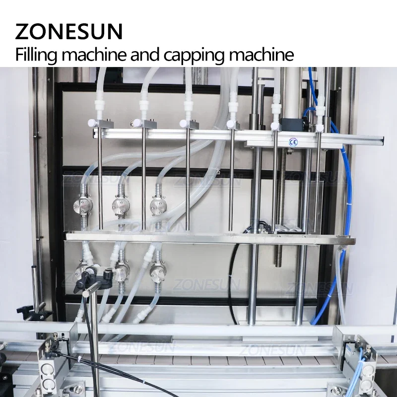 ZONESUN Full Automatic Liquid Filling And Cork Pressing Capping Machine 6 Head Essential Oil With Dust Cover Production Line