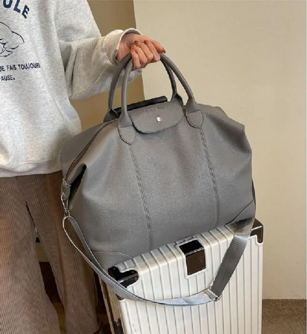 Bolsa de compras de couro macio para homens e mulheres, sacolas de viagem de grande capacidade, bolsa de alta qualidade, moda nova, venda quente