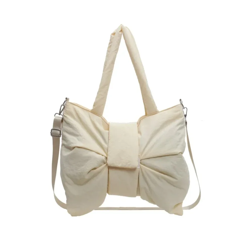 

New summer fashion niche design bow large capacity simple pure color shoulder women's bag hundred texture underarm bags