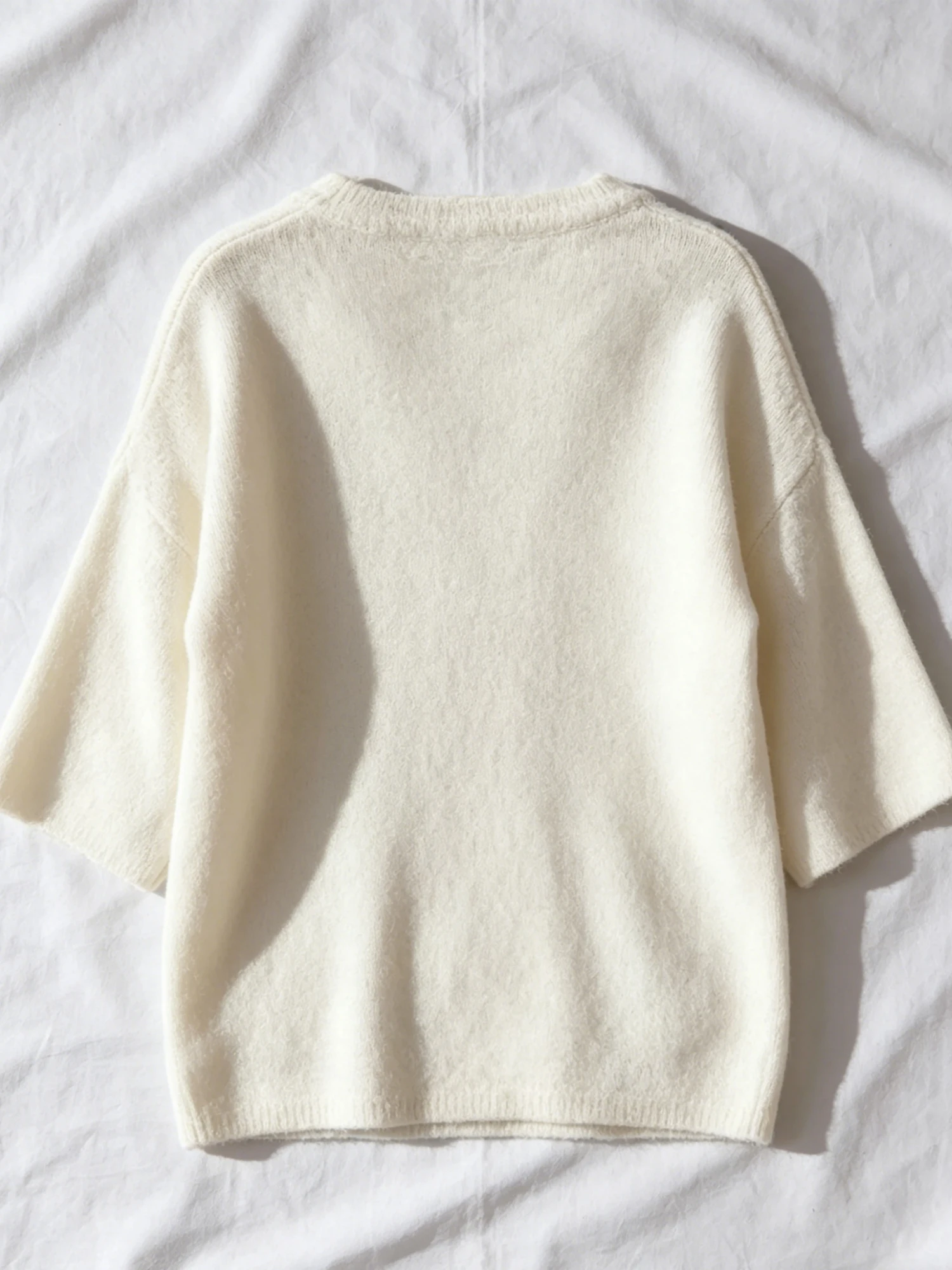 Picture 3: Women's plus size solid color seven quarter sleeved button knit cardigan, suitable for spring and summer fashion styles